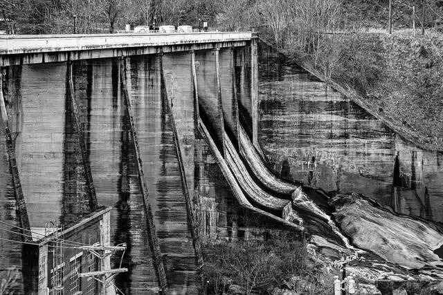 <p>The Lake Lure dam on March 24. Lake Lure received $200,000 in American Rescue Plan Act funding from the state to conduct an assessment of their sewer system, located beneath the Western North Carolina lake.</p>
<p>Colby Rabon|Carolina Public Press</p>