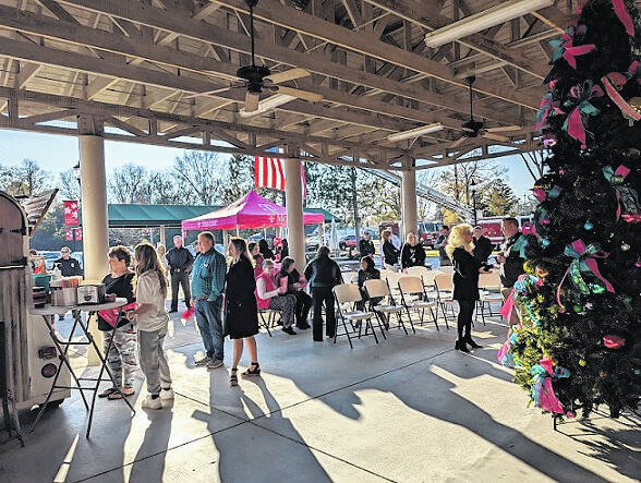 <p>Attendees enjoy fellowship and free coffee while discussing the upcoming changes.</p>
