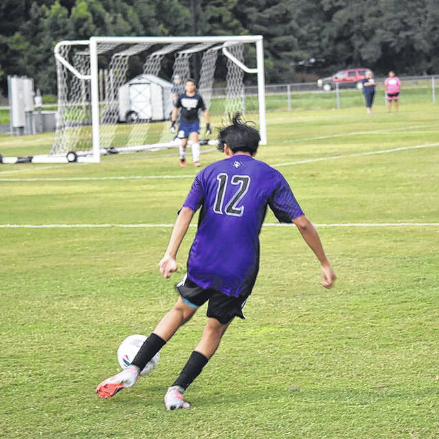 129917279_web1_BLD082223SoccerRU2
West Bladens Alejandro Lopez Sandoval crosses the ball toward the opponents box.
Alex Brooks | Bladen Journal