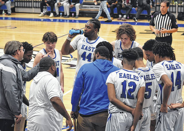 130289491_web1_BLD011224BKHEastBladen001
East Bladen huddles during a timeout Wednesday in a game against the Heide Trask Titans.
Alex Brooks | Bladen Journal