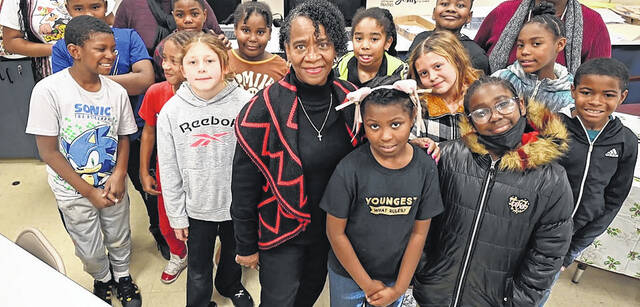 130308006_web1_BLD011924Partners-InMinistry
Dr. Melba McCallum, center, executive director of Partners In Ministry, stands with an after-school class. McCallum was one of the founders of the Scotland County-based nonprofit.
Les High | Border Belt Independent