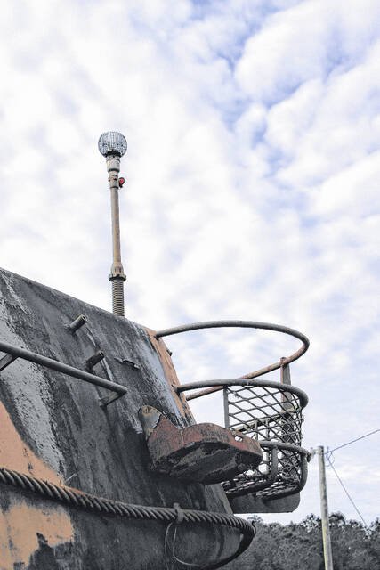 130428425_web1_IMG_5270
Many iconic things have a story to tell. This is a tank basket on the tank outside of the National Guard Armory. There must have been a million stories.