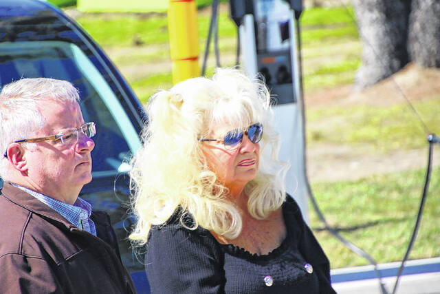 130461275_web1_BLD031924charge--1-
1. Assistant town manager Stephen Duffy and Elizabethtown Mayor Sylvia Campbell listen as Elizabethtown town manager Dane Rideout gives a background on how the charging stations became a reality.