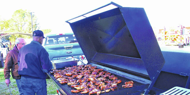 130514852_web1_jones--2-
Mark DeLap | Bladen Journal
Several gas grills were made available to the firefighters from Elizabethtown as the smell of bbq chicken filled the downtown air Saturday. In addition to chicken, there were fresh green beans and potatoes among other things that were perfect for the tired and weary riders who made the 80-mile journey in very cool temperatures.
