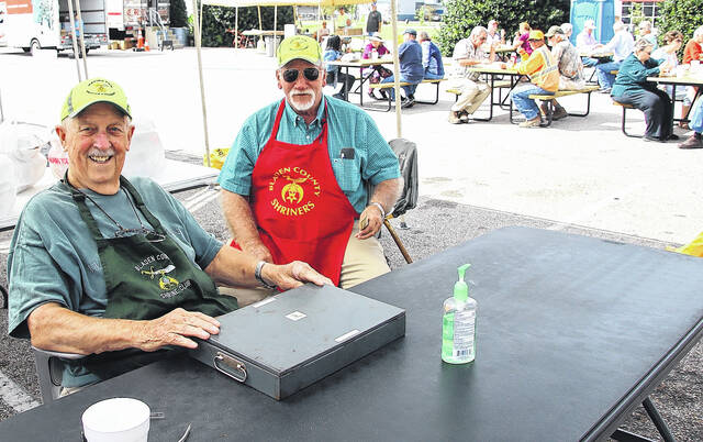 130996251_web1_IMG_0111
Shriner organizers Phillip Little and Wendell Garner were manning the cash table and selling tickets to the thousands of people who showed up for this semiannual fish fry event.