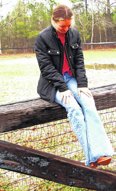 131367628_web1_1
Adrienne Howell grew up boating on White Lake during the summer, but her school year was dedicated to honing her craft, working with her horses, competing in barrel racing and giving lessons.
