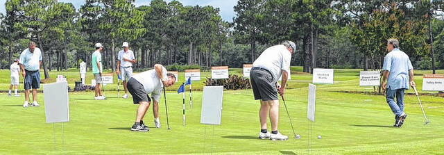 131593051_web1_Schultz_Foundation_golf_01
Golfers practice putting prior to the start of the Whack It, Smack It tournament Saturday, June 14 at Vineyard Golf at White Lake. (Contributed photos)