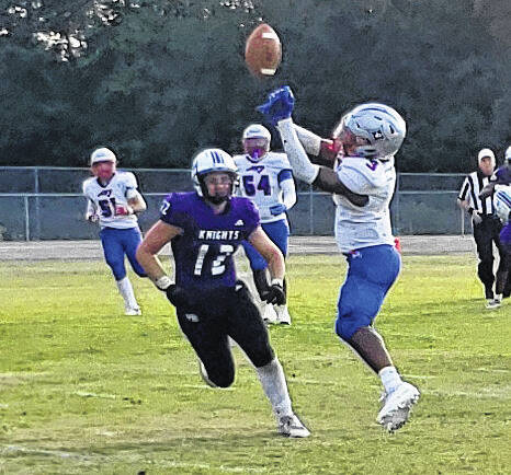 West Bladens Hunter Hester (12) defends against a pass to Penders Jaheim Lambe. The pass was incomplete.
                                 Sonny Jones / Bladen Journal