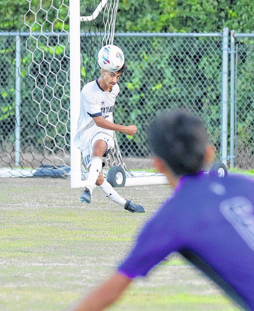 131746228_web1_West_Bladen_East_Bladen_soccer22 
			
				                                East Bladens Ishaq Algozy follows through after kicking the ball Wednesday against West Bladen.
                                 Kenneth Armstrong / <a href="https://www.kenarmphoto.com/" target="_blank">kenarmphoto.com</a>