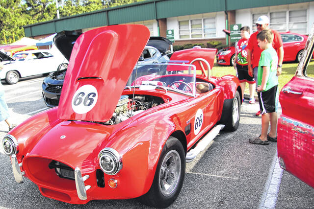 131758886_web1_IMG_3359 
			
				                                The Peanut Festival brought many classic and racing vehicles this year with color and revving engines in the parade.
