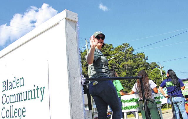<p>Bladen Community College - also located in Dublin, North Carolina is a big supporter of the Peanut Festival and had several vehicles and a float in the parade. College President Dr. Amanda Lee waves to the many supporters who attended the parade.</p>