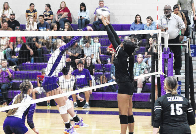 131794394_web1_West_Bladen_South_Columbus_volleyball_01 
			
				                                West Bladens Kimberly Dowless (left) powers the ball over a South Columbus defender during Thursdays volleyball match.
                                 Sonny Jones / Bladen Journal