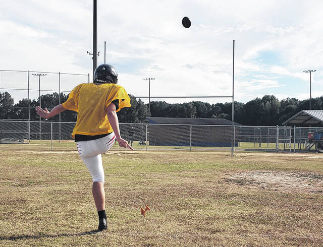 <p>East Bladen JV football team kicker Kenley Parks practices her kicking.</p>
<p>Sonny Jones / Bladen Journal</p>