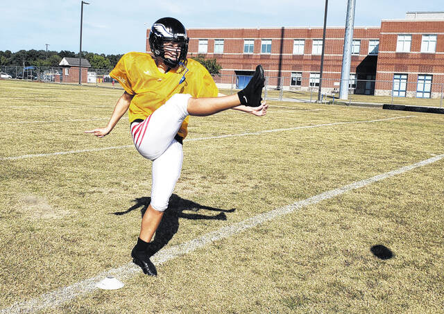 <p>East Bladen JV football team kicker Kenley Parks practices her kicking.</p>
<p>Sonny Jones / Bladen Journal</p>