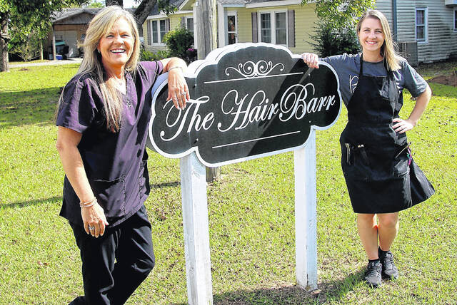 131857898_web1_IMG_5828
Crystal Hayes is the owner of The Hair Barr located at 1005 West King Street in Elizabethtown. The shop has been owned since 2022 by Hayes who is Bladen County born and raised. Kayla Elkins, her daughter who works alongside of her has been in the salon with Hayes since she was a baby and it has created a strong personal and professional bond between the mother/daughter team.