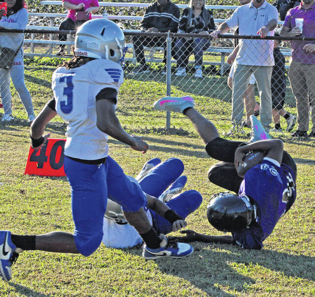 <p>The Bladen County middle school football jamboree Thursday featured West Bladen (purple) and East Bladen (white).</p>
                                 <p>Sonny Jones / Bladen Journal</p>