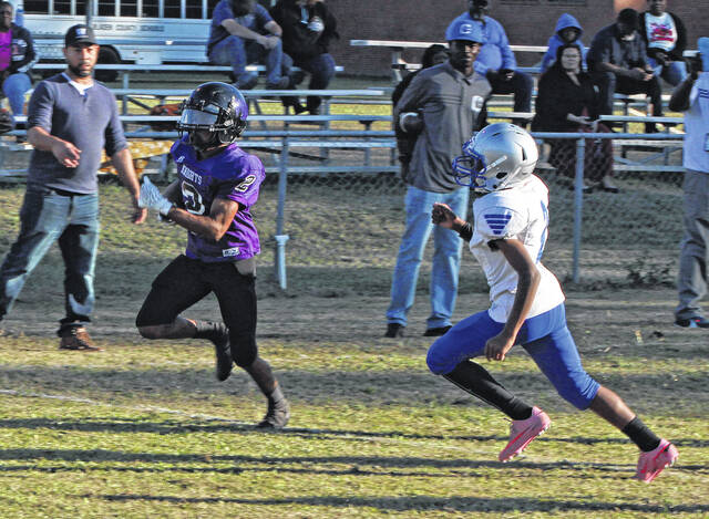 <p>The Bladen County middle school football jamboree Thursday featured West Bladen (purple) and East Bladen (white).</p>
                                 <p>Sonny Jones / Bladen Journal</p>