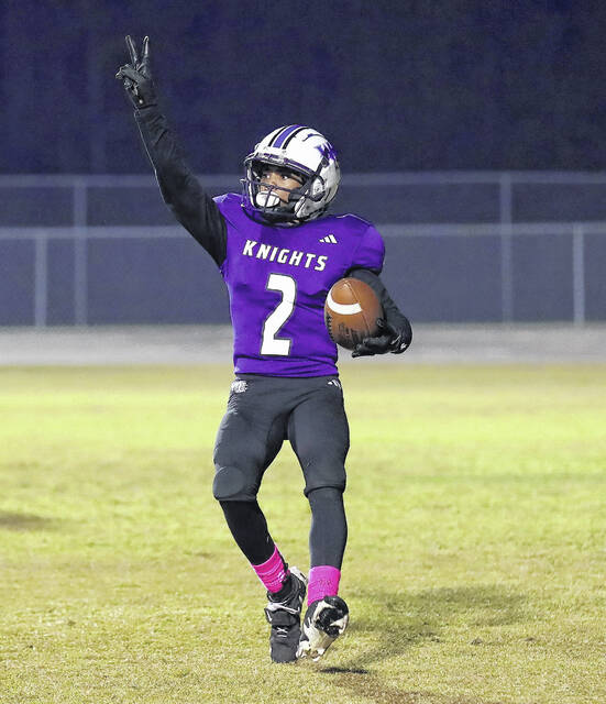 <p>West Bladen’s Keon Whittington (2) celebrates after his second touchdown catch Friday against South Columbus.</p>
                                 <p>Kenneth Armstrong / kenarmphoto.com</p>