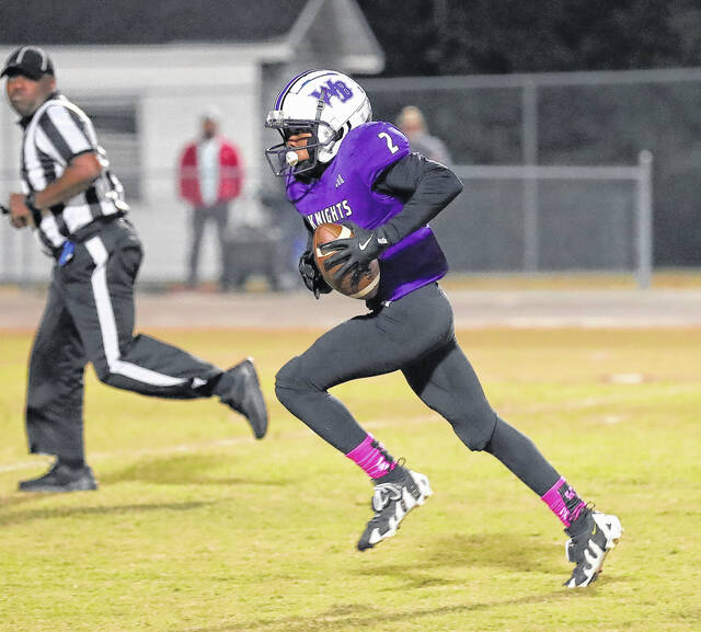 <p>West Bladen’s Keon Whittington runs toward the end zone to complete a 42-yard pass play for a touchdown thrown by quarterback Devan Stanley.</p>
                                 <p>Kenneth Armstrong / kenarmphoto.com</p>