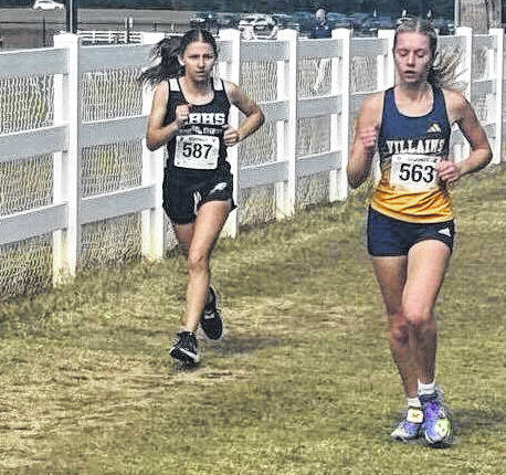 <p>East Bladen’s Aliah Jacobs works to pass a runner during Saturday’s NCHSAA 2A Central Regional cross country meet in Kernersville.</p>
<p>Contributed photo</p>