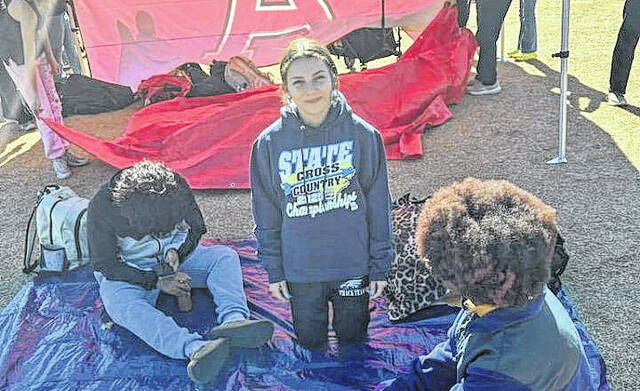 <p>East Bladen’s Aliah Jacobs (center) is shown prior to Friday’s NCHSAA 2A girls’ cross country championship meet in Kernersville. She finished 68th out of 141 runners.</p>
                                 <p>Contributed photo</p>
