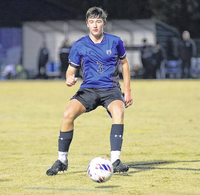 <p>East Bladen’s Easton Bostic controls the ball against Roxboro Community.</p>
<p>Kenneth Armstrong / kenarmphoto.com</p>