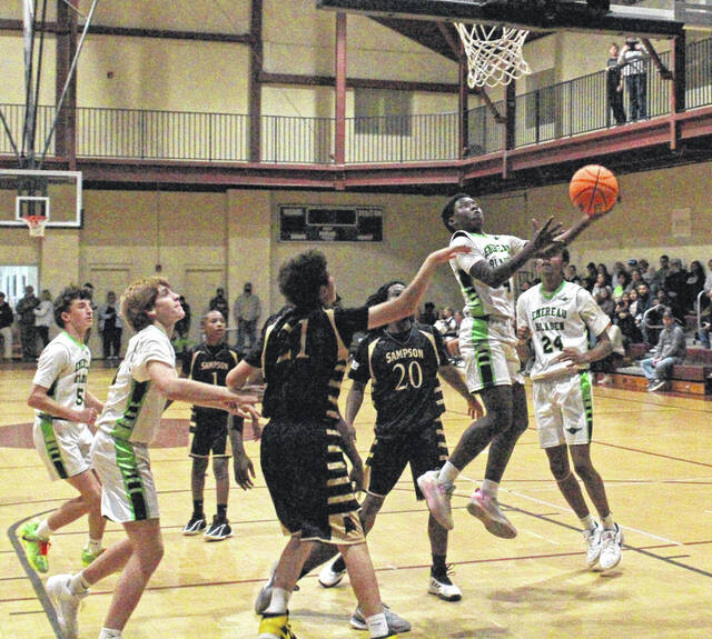 <p>Emereau: Bladen’s Jayden Bordeaux (4) drives to the basket against Sampson Middle on Monday.</p>
<p>Sonny Jones / Bladen Journal</p>