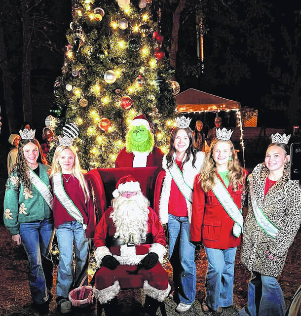 <p>Dublin had their tree lighting Nov. 29 and on a very chilly night, they had the local Peanut Queens pouring hot chocolate before posing with Santa.</p>