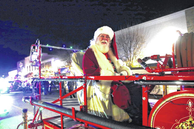 <p>A huge attraction at the Elizabethtown parade was the star of the show - Santa himself - riding on an antique fire engine.</p>