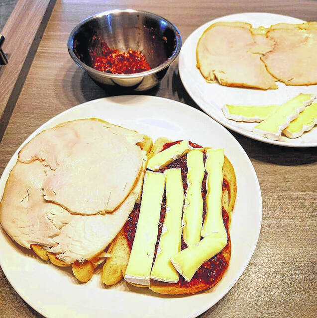 <p>Preparing a sandwich… a dish that tastes like a turkey day - with a twist.</p>