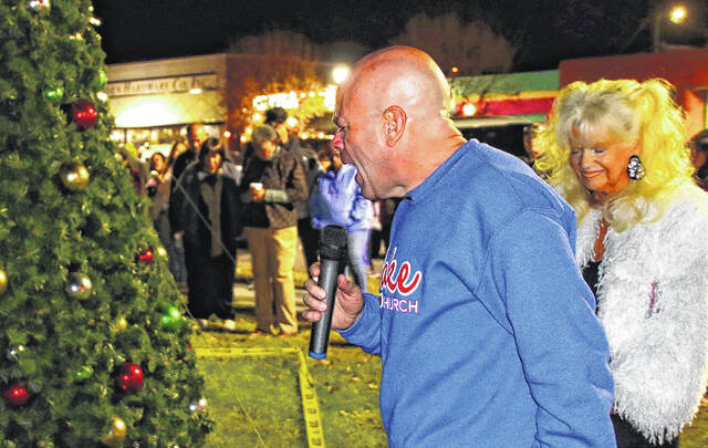 <p>Bladen County Commissioner Cameron McGill is also the pastor at Lake Church in White Lake and is often called upon to give invocations offer prayers for events in Bladen County. He is seen here Nov. 30 in front of the courthouse in Elizabethtown requesting blessings from God before the annual Christmas tree lighting. McGill is an impassioned pastor who has never been one to back down or back away from adversity.</p>