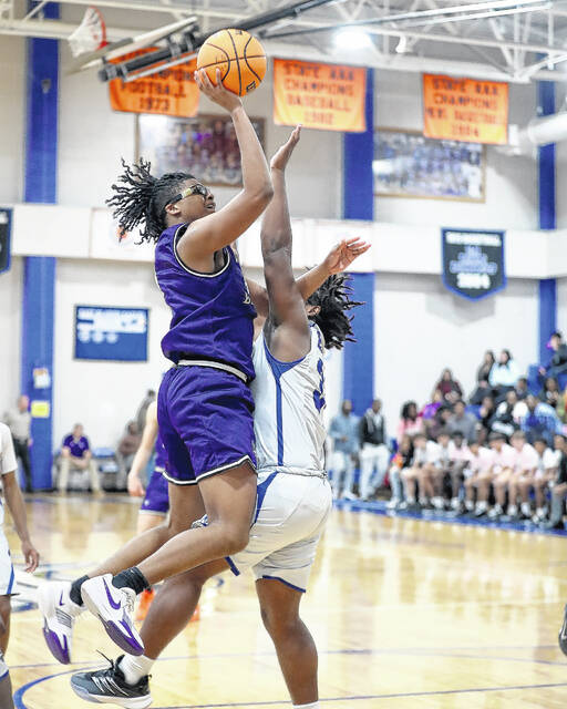 <p>West Bladen’s Tylik McCall goes up for a shot against East Bladen. McCall scored 17 points.</p>
<p>Kenneth Armstrong / kenarmphoto.com</p>