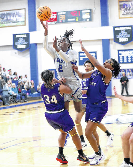 <p>East Bladen’s Keyshawn Kemp (2) drives to the basket against West Bladen.</p>
<p>Kenneth Armstrong / kenarmphoto.com</p>