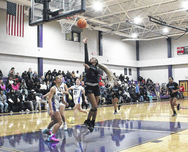 132065730_web1_West_Bladen_East_Bladen_girls_10
East Bladens Aaliyah Monroe (2) spins and scores against West Bladen on Wednesday in a non-conference high school girls basketball game.
Sonny Jones / Bladen Journal