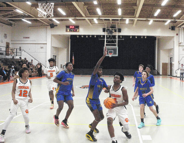 <p>Action during the Elizabethtown and Whiteville Central boys’ basketball game inside Samuel C. Boger Gymnasium.</p>
<p>Sonny Jones / Bladen Journal</p>