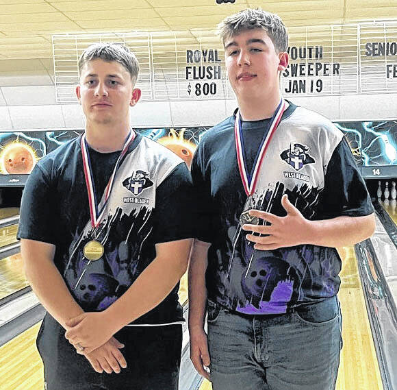 132102686_web1_West_Bladen_bowling_singles
West Bladens Caison Brixey (left) and Brody Rhodes earned berths in the state bowling tournament.
Contributed photo