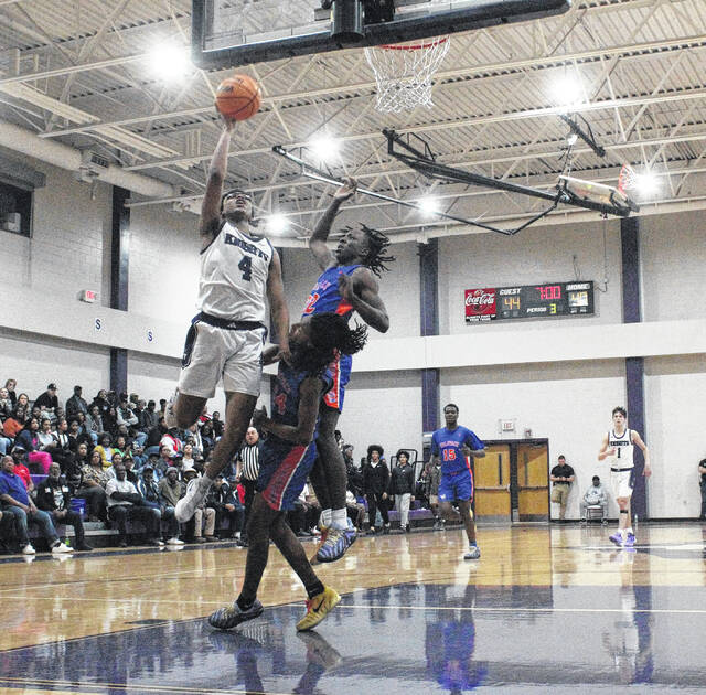 West Bladens Tylik McCall (4) drives to the basket to score two of his game-high 30 points against Whiteville on Thursday, Feb. 19.
                                 Sonny Jones / Bladen Journal