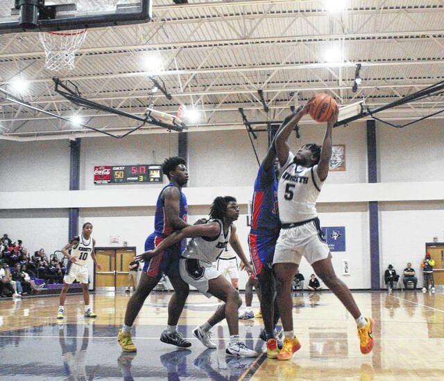 West Bladens Kendell Lessane (5) works inside for a shot against Whiteville.
                                 Sonny Jones / Bladen Journal