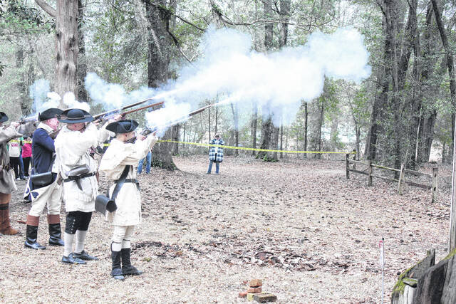Muskets are fired by members of the New Bern Musket Team during the Colonial Faire held Sunday, Feb. 22 at Harmony Hall Village Plantation.
Sonny Jones / Bladen Journal