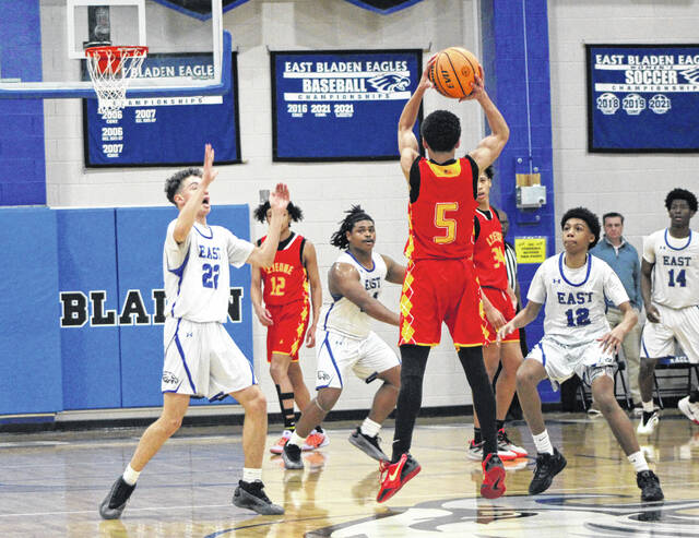 <p>Lejeune’s Eli Winston (5) looks to make a pass to a teammate as East Bladen’s Landyn Scott (22) and John Monroe (12) apply pressure.</p>
<p>Braylon Cromartie / East Bladen journalism class</p>