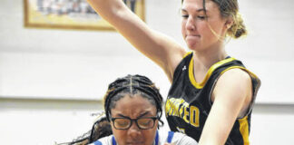 
			
				                                East Bladens Sanaa Singletary (14) works inside against Manteo in Thursdays NCHSAA girls basketball playoff game.
                                 Xavier Potts and Braylon Cromartie / East Bladen journalism class

			
		