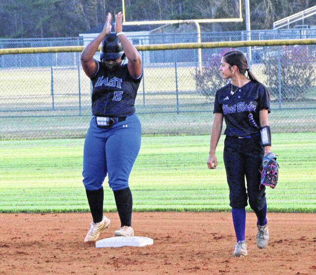 East Bladens Niyah Wooten celebrates after ripping a double off the fence against West Bladen.