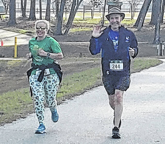 Melody Paulishak (left) and William Irelan, both of Lafayette, Colorado, ran in the Lucky Half-Marathon.
                                 Sonny Jones / Bladen Journal
