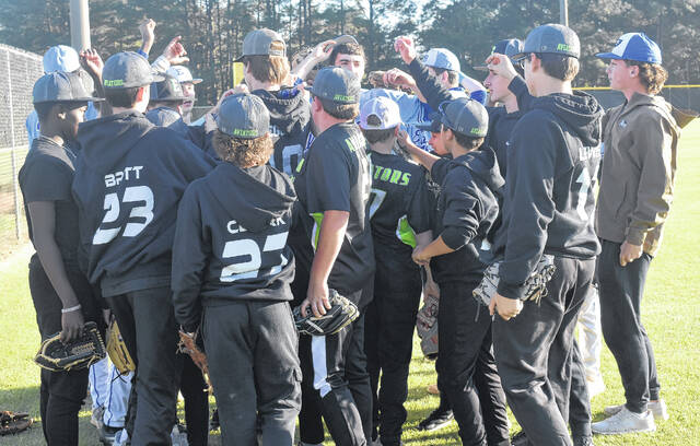 The Emereau: Bladen baseball team joined the East Bladen team on the field prior to the game against Union.
                                 Xavier Potts / East Bladen journalism class