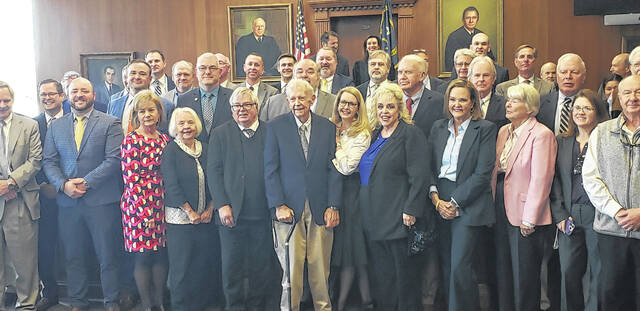 Retired Judge Giles Clark poses with court officials Tuesday, March 24 following the unveiling of his portrait that will hang inside the Superior Courtroom of the Bladen County Courthouse.
                                 Sonny Jones / Bladen Journal