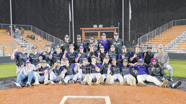 The West Bladen baseball team with the trophy after winning the Randy Ledford Memorial Easter tournament Tuesday, beating Cape Fear 5-4 at South View High School.
                                 Photo by Diane Trinidad