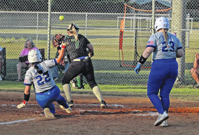 East Bladens Gracey Edwards (22) slides safely into home to score on a wild pitch against North Duplin on Thursday.
                                 Sonny Jones / Bladen Journal