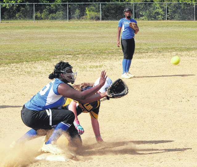 A Bladenboro runner slides safely into third base as Clarktons Chyna Smith prepares to catch the throw.
                                 Sonny Jones / Bladen Journal