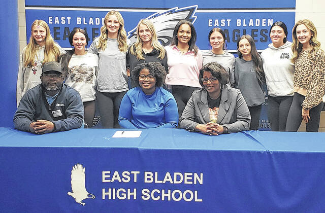 East Bladen softball player Niyah Wooten (seated, center) signed to play at Pitt Community College next season. Her parents, LaQuan Wooten (seated, left) and Ursala Wooten (seated, right) along with her East Bladen teammates were party of the ceremony.
Sonny Jones / Bladen Journal