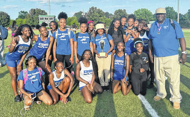 The East Bladen girls track and field team and Coach Wilson Bolden won the Carolina Conference championship Wednesday, April 29 at Mount Olive University.
                                 Contributed photo